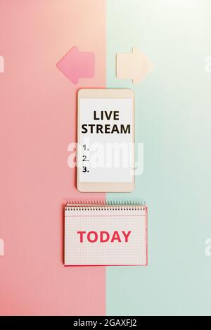 Hand schreiben Zeichen Live Stream. Geschäftsansatz zur Übertragung eines Video- oder Audiomaterials unter Verwendung von technologischen Unterschieden und Auswahlmöglichkeiten im Internet Stockfoto
