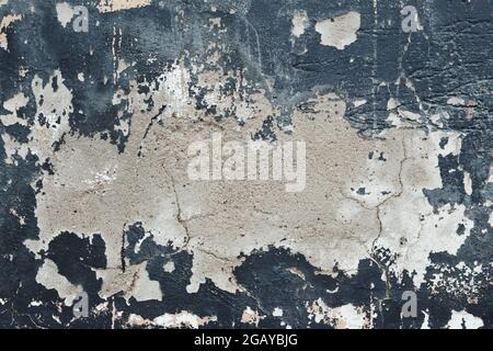 Alte Wand mit abblätterndem Putz aus der Nähe Stockfoto