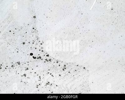 Abstraktes gesprenkeltes Farbmuster auf grauem weißem Hintergrund Stockfoto
