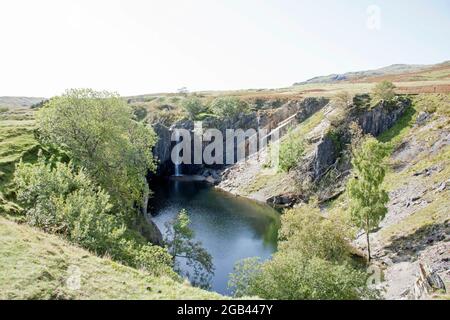 Überfluteter Steinbruch von Torver Beck in der Nähe von Torver High Common, Lake District Cumbria England Stockfoto