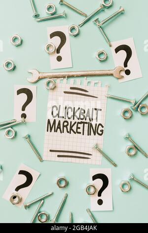 Text mit Inspiration Clickbait Marketing. Word für Online-Inhalte, die darauf abzielen, Seitenaufrufe zu generieren Neue Ideen Brainstoming für Wartungsplanung Stockfoto