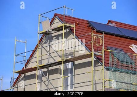Neubau mit fertiger Grundputz Stockfoto