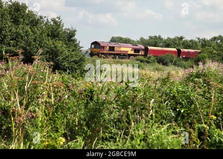 DB Cargo Class 66 Lok 66039 schleppt die 1055 Immingham am 3/7/21 nach Scunthorpe Steelworks, nördlich von Brigg. Stockfoto