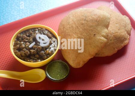 Chana Masala Kichererbsen serviert mit Reis. Traditionelle Speisen. Stockfoto