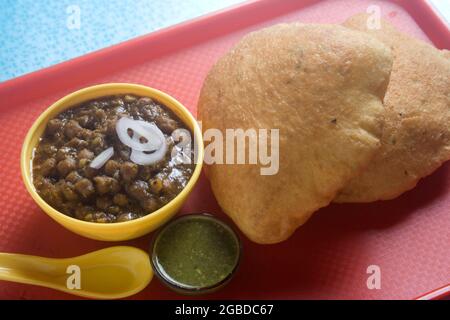 Chana Masala Kichererbsen serviert mit Reis. Traditionelle Speisen. Stockfoto