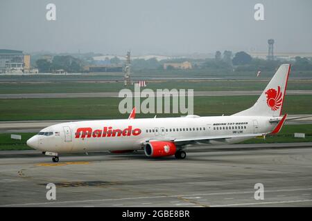 Malindo Airways (eine malaysische Hybrid-Full-Service-Fluggesellschaft der Indonesian Lion Air Group), Boeing 737-900ER Stockfoto
