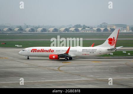 Malindo Airways (eine malaysische Hybrid-Full-Service-Fluggesellschaft der Indonesian Lion Air Group), Boeing 737-900ER Stockfoto