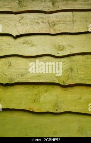 Nahaufnahme einer grün lackierten Holzstruktur Stockfoto