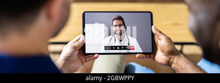 Medizinischer Doktor Video-Konferenzgespräch Auf Tablet-Computer Stockfoto