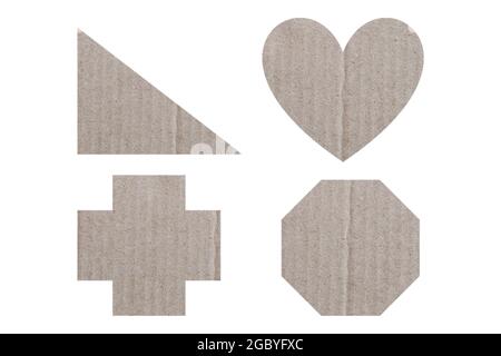 Geometrischer Satz von Papierkartons, isoliert auf weißem Hintergrund und mit Beschneidungspfaden. Stockfoto