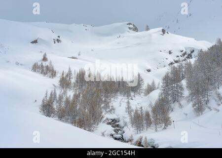 FRANKREICH, SAVOIE (73), VAL-D'ISERE, WINTERLANDSCHAFT DES ISERE-TALS ÜBER DEM FORNET Stockfoto