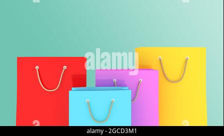 Bunte Papier-Einkaufstaschen auf grünem Hintergrund., 3D-Rendering. Stockfoto