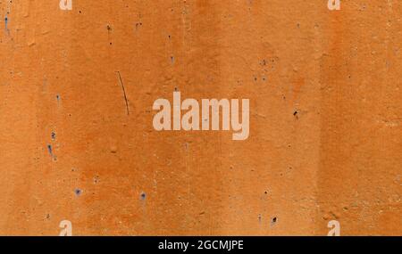 Alte Farbflecken an der veralteten Eisenwand. Metall Oberfläche Textur Hintergrund Stockfoto