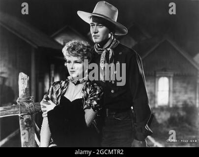 CLAIRE TREVOR und JOHN WAYNE in STAGECOACH 1939 Regisseur JOHN FORD Originalgeschichte Ernest Haycox Drehbuch Dudley Nichols Walter Wanger Produktionen / Vereinte Künstler Stockfoto