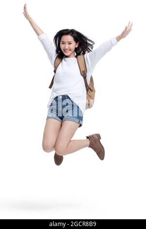 Glückliche junge Frau springen Stockfoto