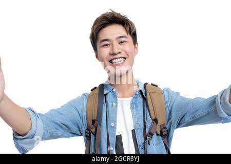 Junge Universitätsstudentin beim Selfie Stockfoto