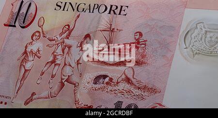 Rückseite des 10 Singapur-Dollar. Währung des Stadtstaates Singapur. Nahaufnahme von zehn singapurischen Dollar. Polymer-Geld mit dem Sport-Motiv Stockfoto