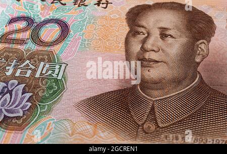 Makrofotografie von 20 Yuan der Volksrepublik china. Nahaufnahme von bis zu 20 Renminbi mit dem Porträt von Mao Zedong. Extrem mikroskopische Erfassung von Stockfoto