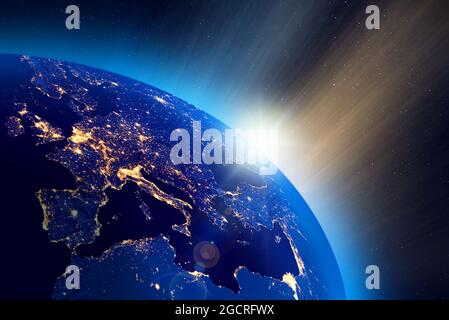 Illustration des Sonnenaufgangs über dem Planeten Erde, europäische Stadtlichter sichtbar. Einige Elemente des Bildes, die von der NASA eingerichtet wurden. Stockfoto