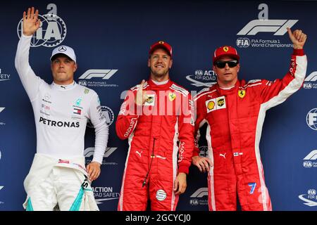 Qualifying Top 3 in Parc Ferme (L bis R): Valtteri Bottas (FIN) Mercedes AMG F1, Zweiter; Sebastian Vettel (GER) Ferrari, Pole Position; Kimi Räikkönen (FIN) Ferrari, Dritter. Großer Preis von Deutschland, Samstag, 21. Juli 2018. Hockenheim, Deutschland. Stockfoto