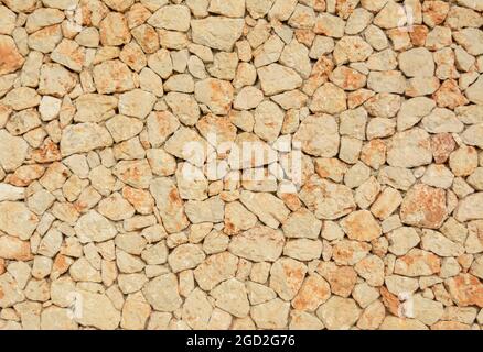 Natursteinwand, Sandfarbe Textur, Stockfoto