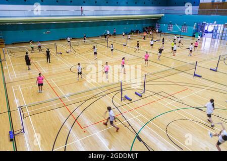 China Hong Kong HK Island Central, Hong Kong Park Sports Center Center, Badminton Courts Indoor innerhalb Gymnasium Gym Asiatische Mädchen weiblich, Jungen männliche Stuten Stockfoto