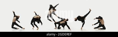 Tanz der Gefühle. Erstaunliche Leistung eines flexiblen männlichen Balletttänzers, der isoliert auf weißem Hintergrund trainiert. Konzept von Kunst, Schönheit, Aspiration Stockfoto