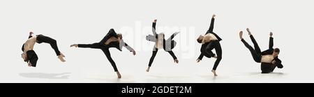 Levitation. Erstaunliche Leistung eines flexiblen männlichen Balletttänzers, der isoliert auf weißem Hintergrund trainiert. Konzept von Kunst, Schönheit, Aspiration Stockfoto