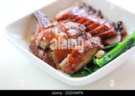 Grill-Ente und Schweinefleisch Stockfoto