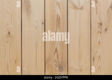 Hintergrund von den vertikalen Holz unbemalten Bretter. Stockfoto