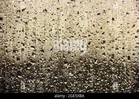 Regentropfen auf dem Glas. Hintergrund Stockfoto