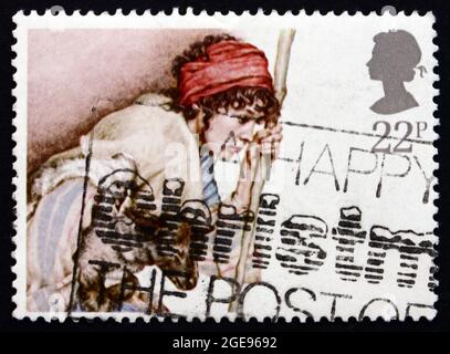 GROSSBRITANNIEN - UM 1984: Eine in Großbritannien gedruckte Briefmarke zeigt Shepherd und Lamm, von Yvonne Gilbert, um 1984 Stockfoto