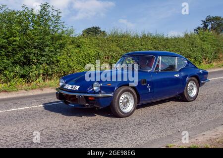 1972 70er Jahre blaues Triumph GT6 2dr Coupé auf dem Weg zur Capesthorne Hall classic July Car Show, Ceshire, UKRIUMPH GT6 Stockfoto