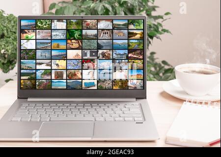 Viele verschiedene Bilder in Video-Streaming auf dem Bildschirm Laptop. Digitales Video- und Mobile-Media-Konzept Stockfoto