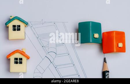 Heimspielzeug und Accessoires mit Regenwasserrohr Zeichenpapier. Stockfoto