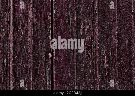 Dunkle Struktur aus purpurfarbenem Holz. Grunge verzweifelte hölzerne Türbretter. Alte Holzkulisse. Stockfoto