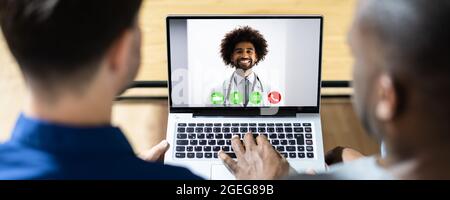 Arzt Video-Telefonkonferenz Am Computer Stockfoto