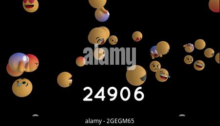 Emoji-Symbole fliegen auf schwarzem Hintergrund in 4k Stockfoto
