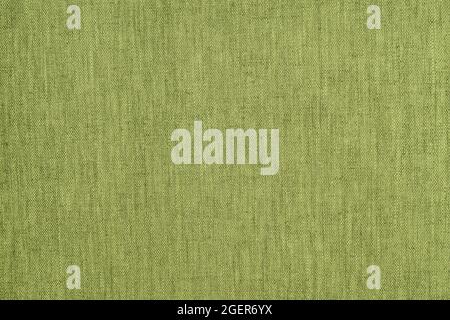 Strukturierter Hintergrund oder Tapete aus dem rauen Stoff der grünen Limettenfarbe Stockfoto
