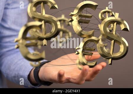 Ein Geschäftskonzept mit schwebenden Währungssymbolen auf einer Hand Stockfoto