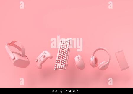 Flying Gamer Zahnräder wie Maus, Tastatur, Joystick, Headset, VR auf rosa Stockfoto