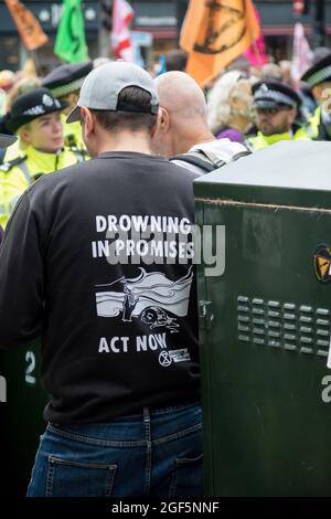 London, Großbritannien, 21. August 2021:- Mitglieder der Extinction Rebellion protestieren in Central London Stockfoto