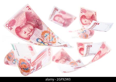 Einhundert Yuan-Banknoten, die zusammenfallen, Renminbi oder rmb, chinesisches Geld, fallen, Invasion der chinesischen Wirtschaft Stockfoto