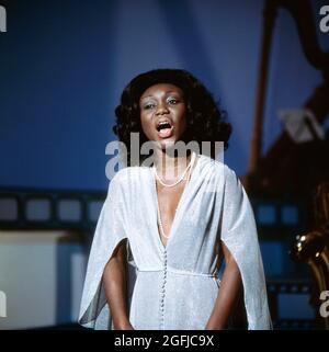 Felicia Weathers, amerikanische Opernsängerin, Stargast in der TV-Show: Max Greger: Musik Musik Musik, ZDF, 26. Februar 1976, singt Lieder aus den Musicals Swingtime und Porgy and Bess. Felicia Weathers, amerikanische Opernsängerin, Stargast in der TV-Show: Max Greger: Musik Musik Musik, ZDF, 26. Februar 1976, singt sie Lieder aus den Musicals Swingtime und Porgy und Bess. Stockfoto