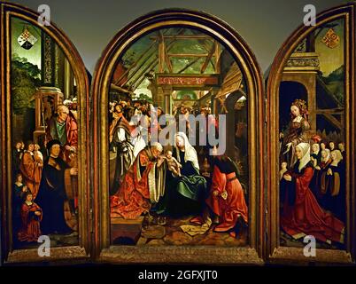 Die Anbetung der drei Könige, 1517 von Jacob Cornelisz. Van Oostsanen, 1472-1533 ( Könige das Kind Jesus. Auf den Seitenwänden sind die Schutzpatrone, die Kinder und die Schutzheiligen dargestellt. Vater mit sechs Söhnen und der heilige Hieronymus, Mutter mit sieben Töchtern und die heilige Katharina. Zwei Kinder, in weißen Gewand dargestellt, waren bereits gestorben.) Stockfoto