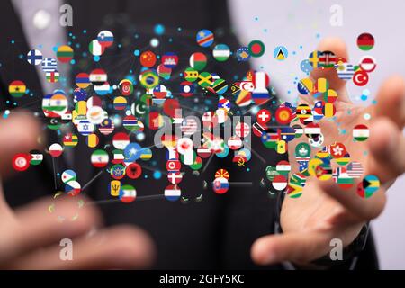 Nahaufnahme von 3D-gerenderten Flaggen verschiedener Länder in den Händen des Menschen Stockfoto