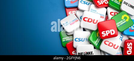 Logos der größten deutschen Parteien (CDU CSU, SPD, die Grünen, FDP, die Linke, AfD) läuft für die Bundestagswahl auf einem Haufen auf einem Tisch. Stockfoto