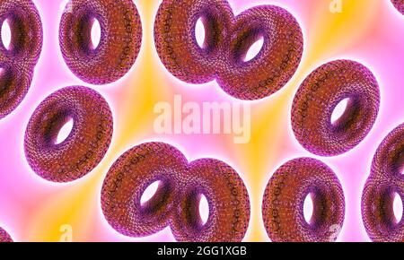 Bronze Donuts Kaleidoskop auf rosa und orange Hintergrund. Stockfoto