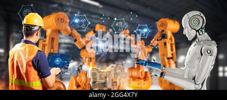 Techniker oder Techniker arbeiten im Werk mit einem 3d-Renderroboter Stockfoto