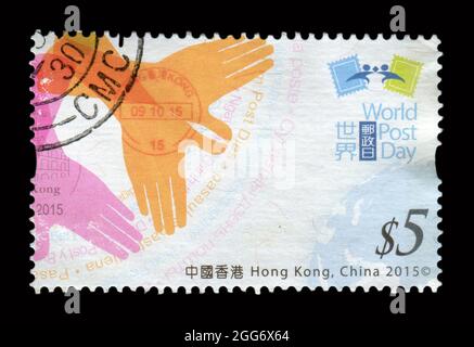 Die in HONGKONG, China, gedruckte Briefmarke zeigt das Bild des Weltposttages, um 2015. Stockfoto